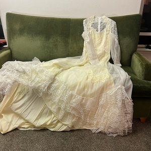 Vintage wedding dress with train and beautiful appliqués